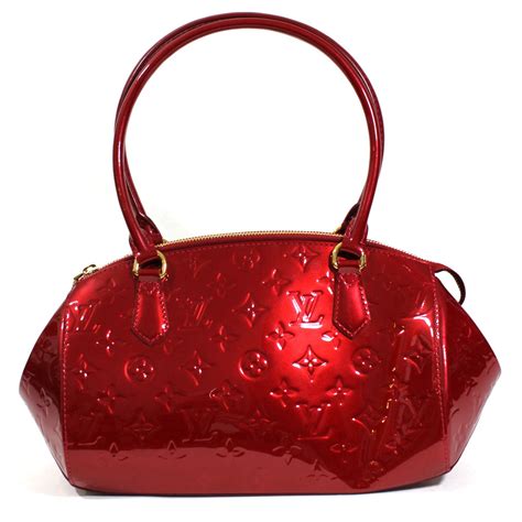 red leather louis vuitton purse|louis vuitton with red trim.